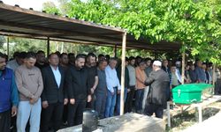 Mersin'de denizde cesetleri bulunan iki kişiden birinin cenazesi toprağa verildi